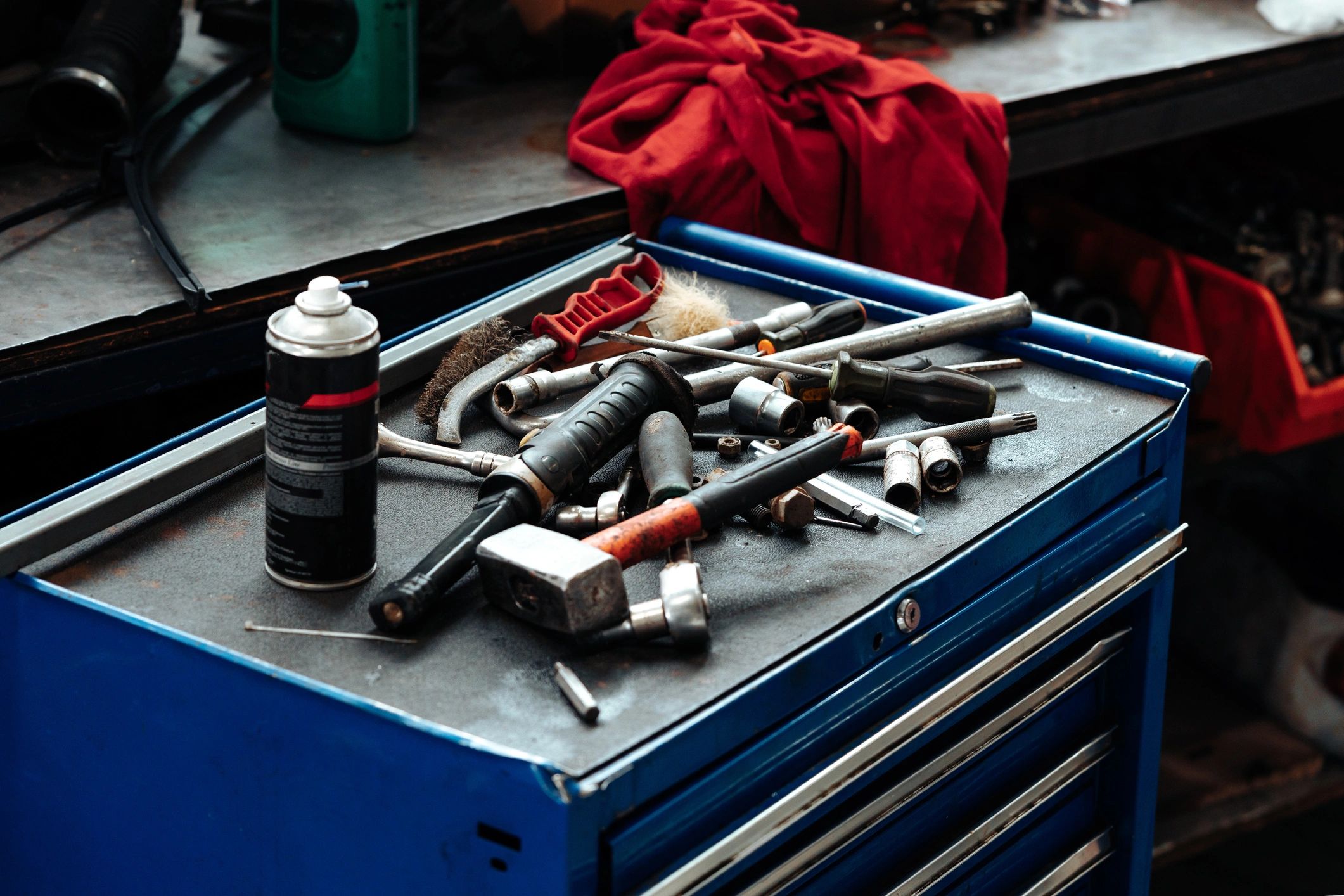 Tools on a workbench in an auto service bay