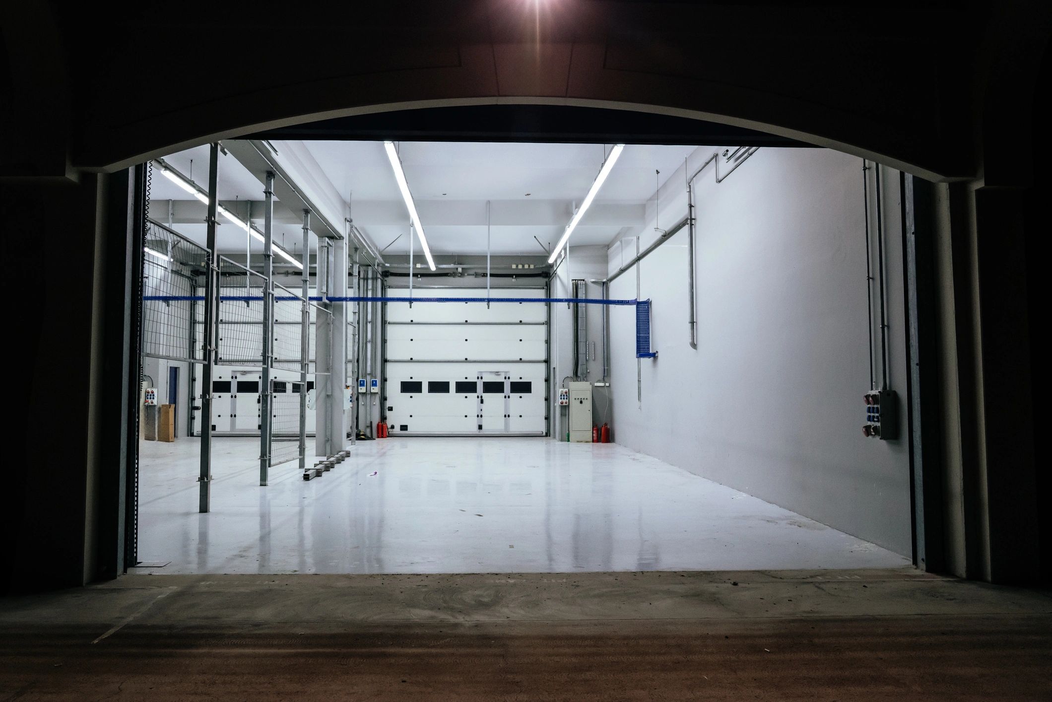 Clean auto service bay with tools and equipment